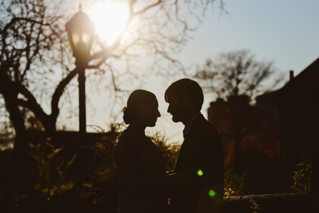 Sunset photos with bride and groom outside of Stone Park Events